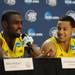 Michigan junior Tim Hardaway Jr. and sophomore Trey Burke smile as they answer questions from the press at Cowboys Stadium in Arlington, Texas on March 29, 2013. Melanie Maxwell I AnnArbor.com